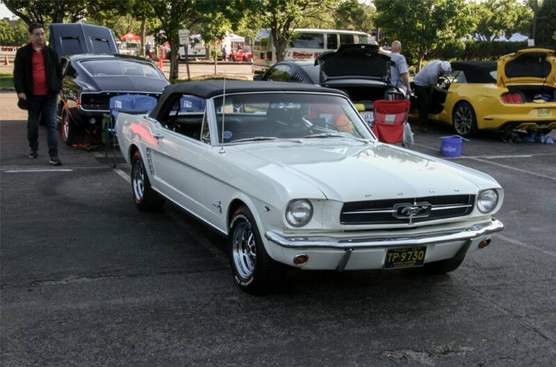 A classic white Mustang on display