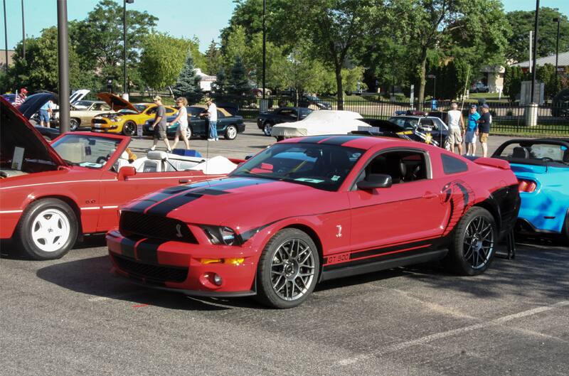 A red Shelby Mustang on display