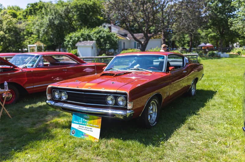 A classic red vehicle on display