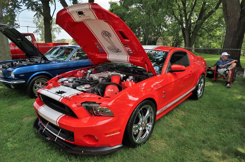 A red Mustang on display