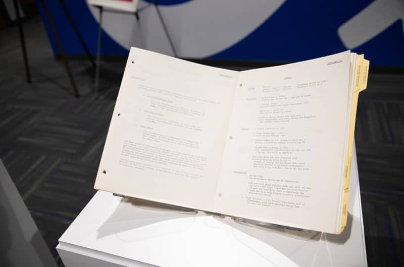 Close up of an open file of papers on display