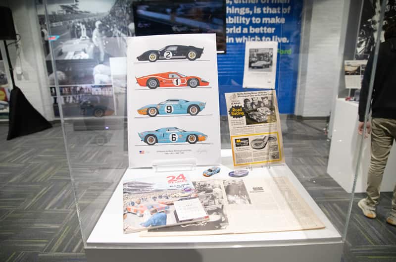 Glass box of various GT drawings and magazines on display