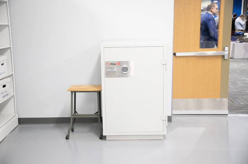 A white safe in an office