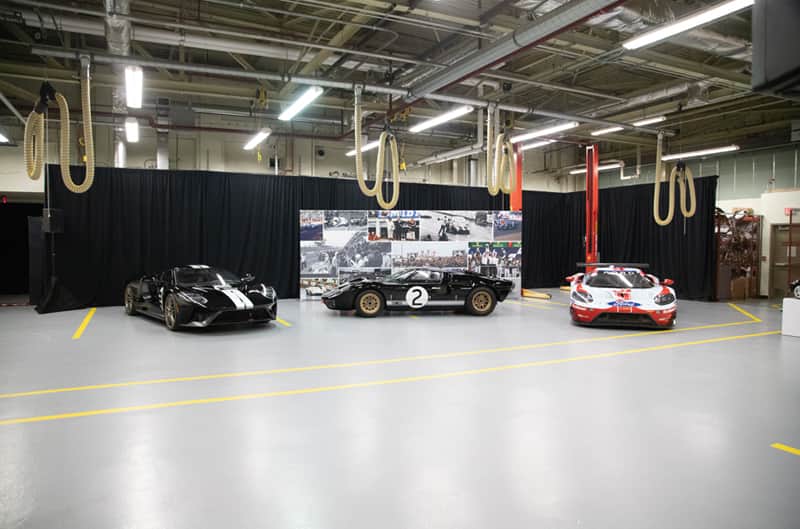 Two black and one red and white GT on display