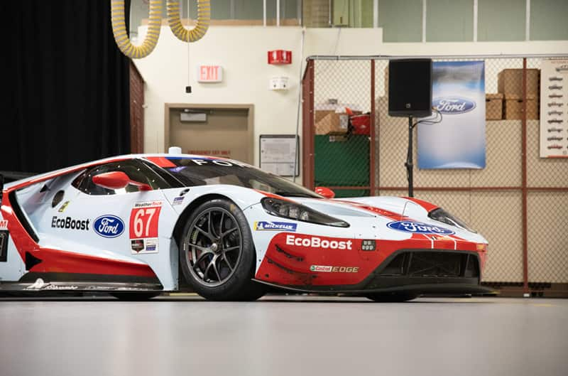 Front profile of a white and red EcoBoost GT on display