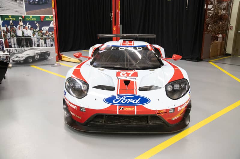 Front of a white and red EcoBoost GT on display