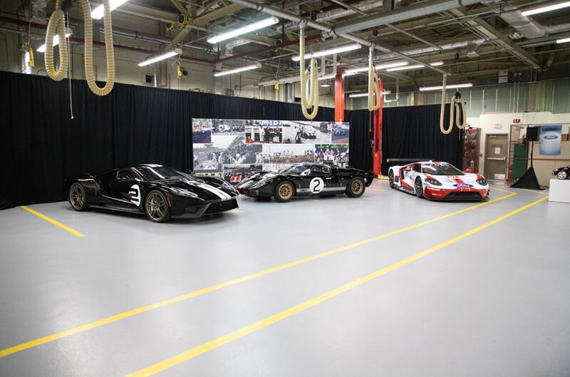 Two black and one red and white GT on display