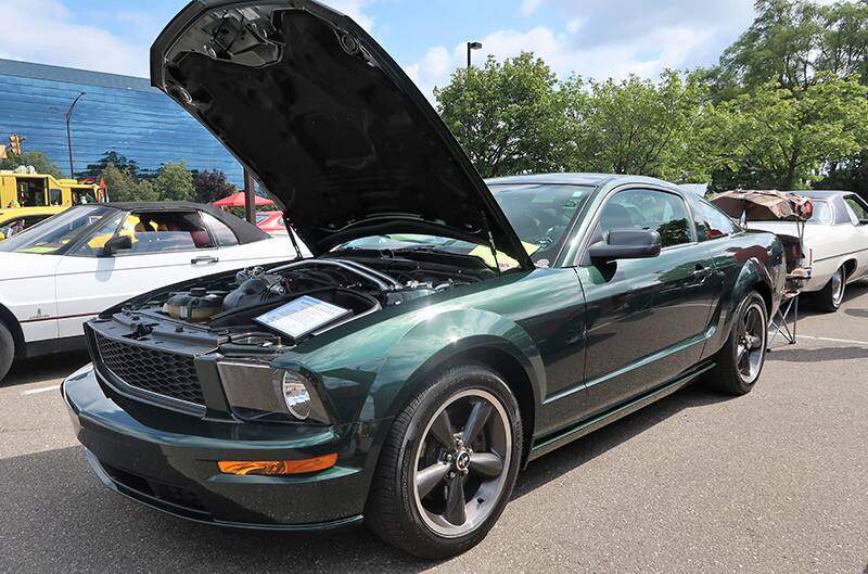 A green Mustang on display