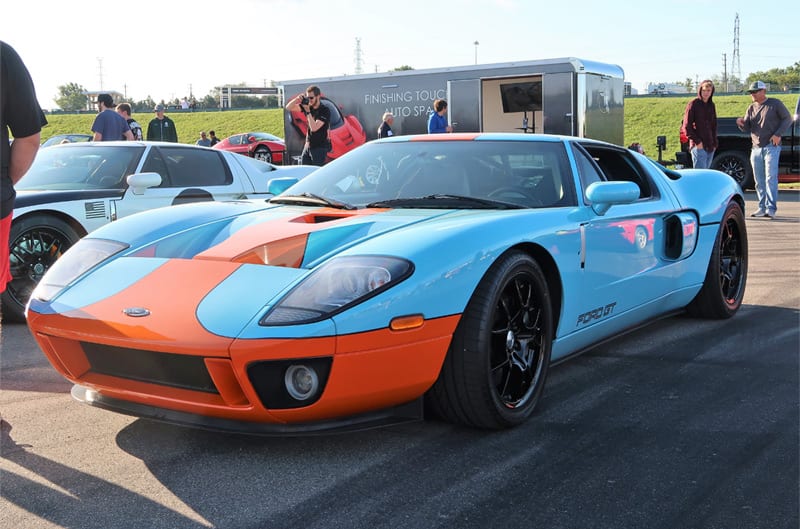 Front of a blue and orange Heritage GT in parking lot