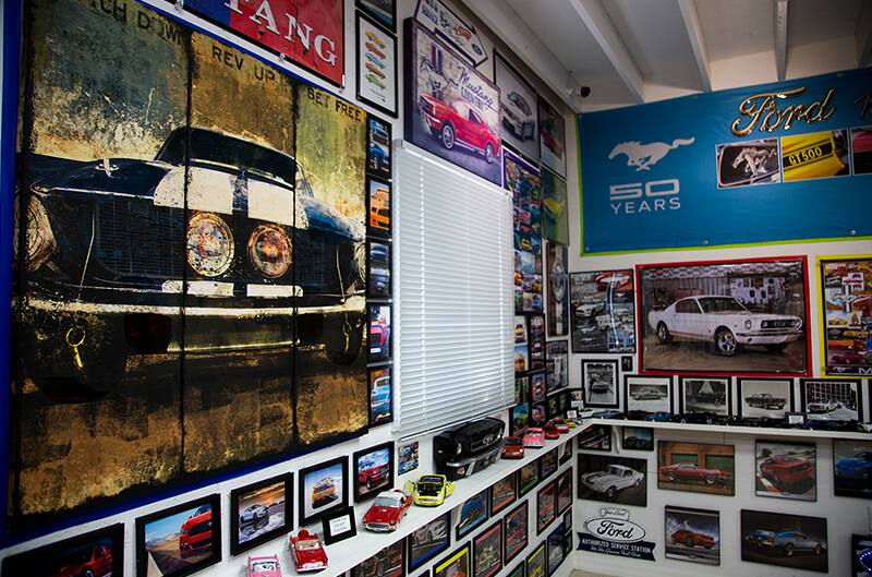 Walls of Ford images with shelves of Ford diecasts