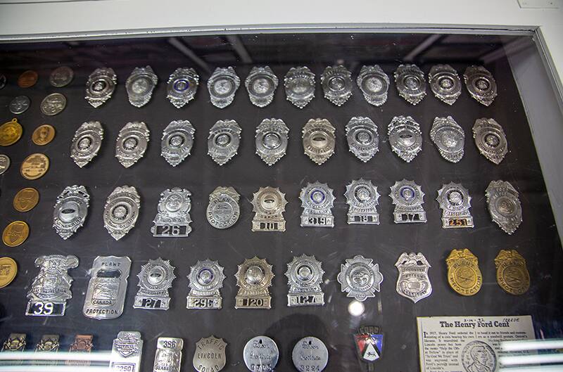 Wall full of various badges