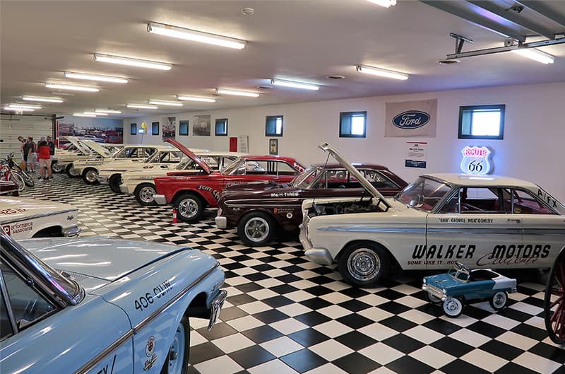 Various Cyclones lined up in a garage