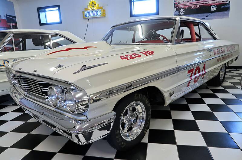 Front profile of a white Cyclone in a garage