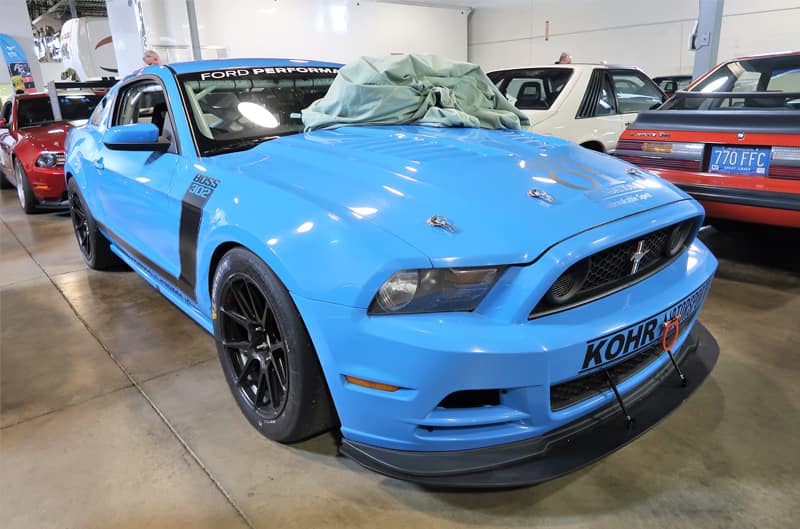 A blue Ford Performance Mustang boss on display