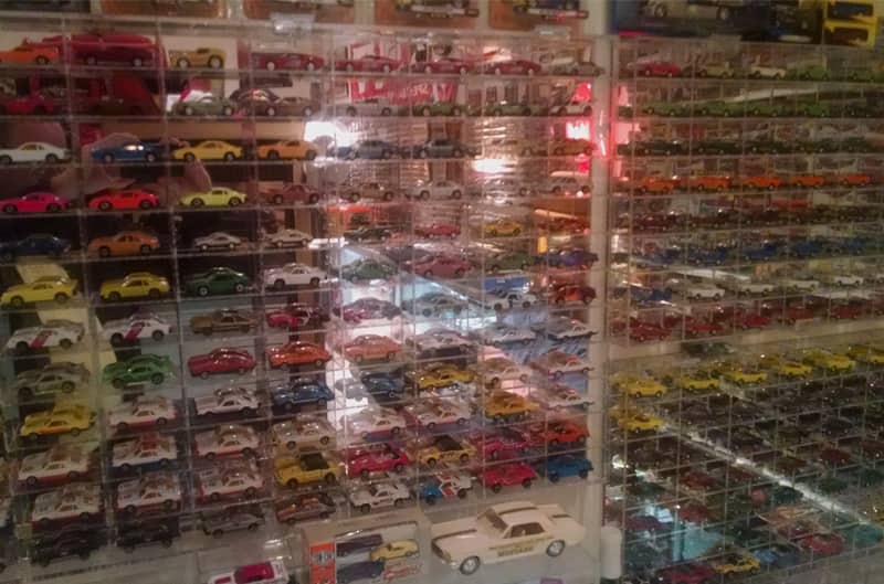 Display shelves of various toy Ford cars