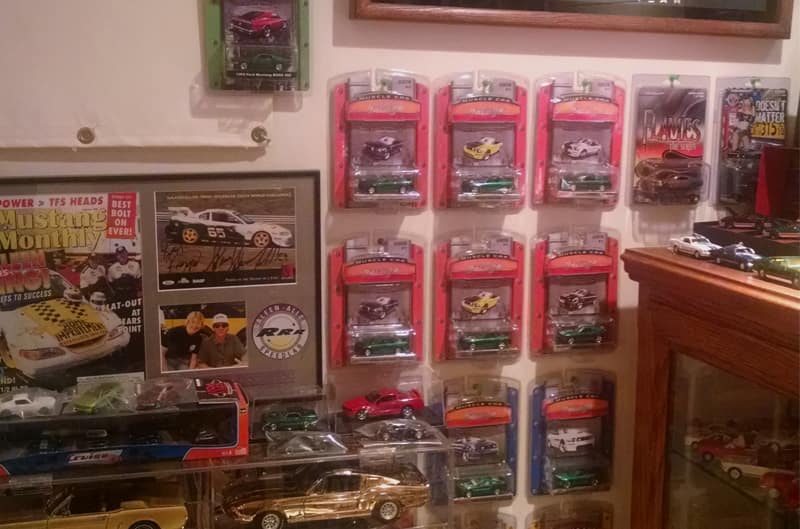 Wall of various hanging toy cars