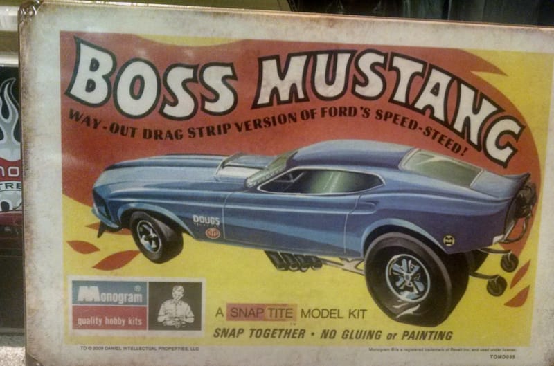 Graphic of a blue Boss Mustang on box