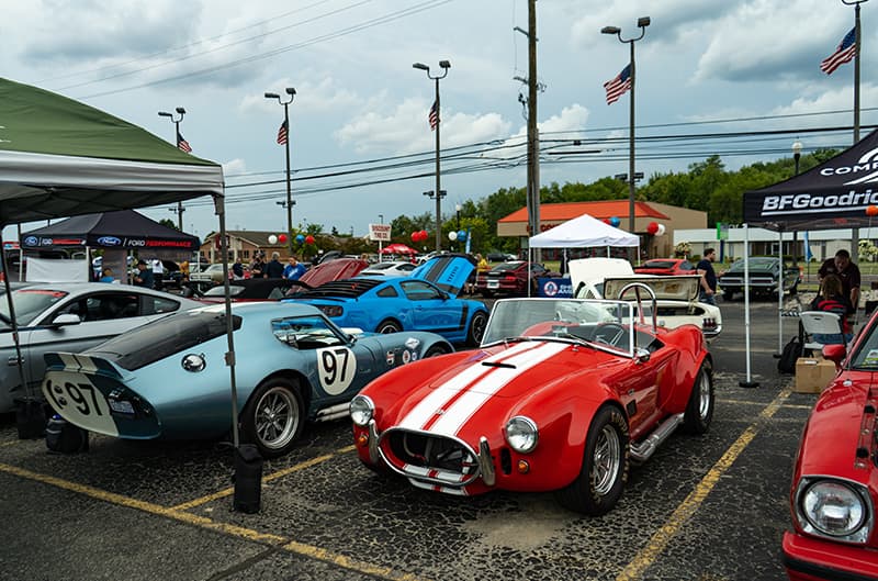 red shelby cobra with white stripes