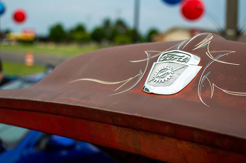 Pin Striping on rusted ford hood