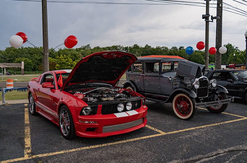 red S197 Mustang with hood open