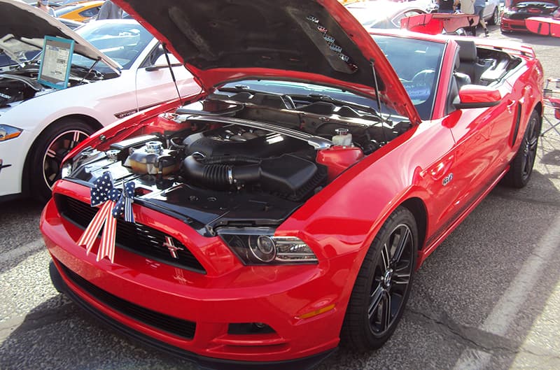Red S197 Mustang with bow on the front