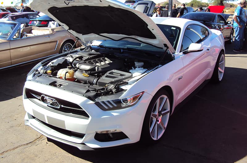 White S550 Mustang with hood open