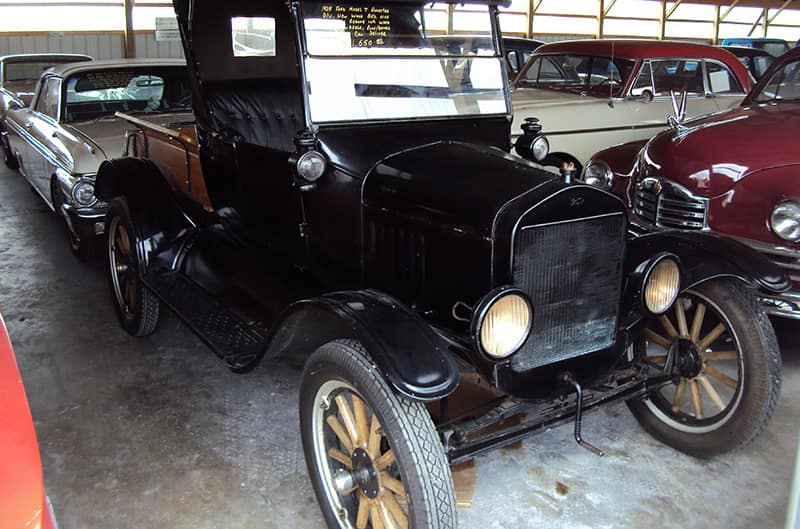 black ford model t stored inside