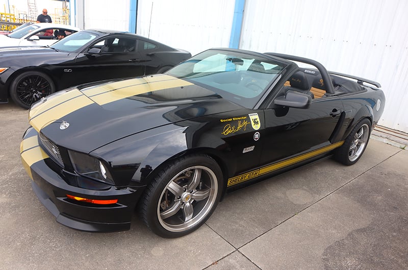 Black S197 Mustang with Gold stripes