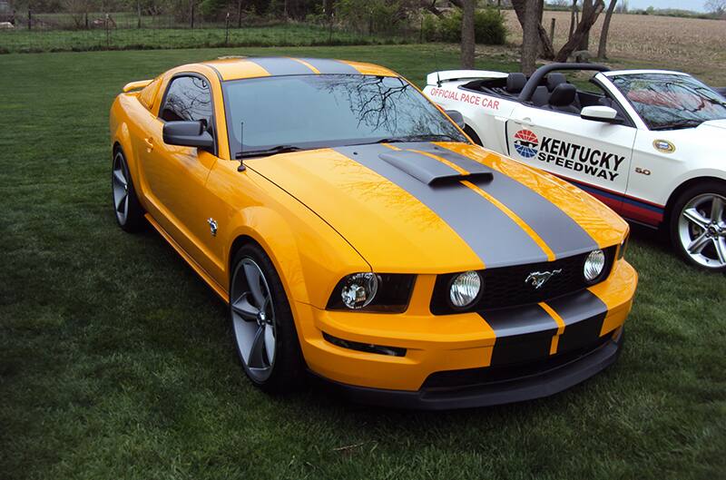 Orange S197 Mustang with Black stripes