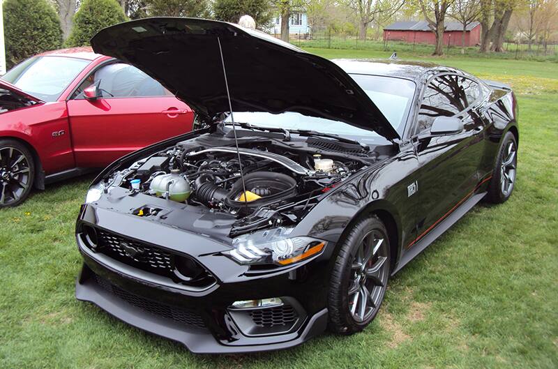 Black 2021 Mach 1 Mustang with hood open