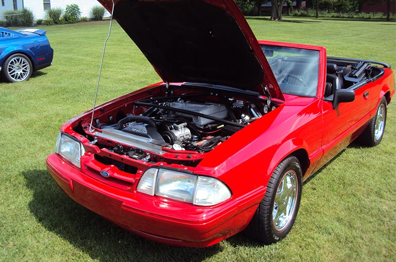 Red Foxbody with hood open
