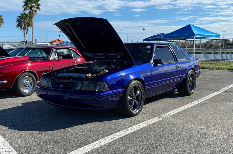 Sonic Blue Foxbody Mustang with hood open