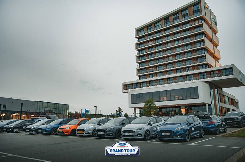 Focus vehicles in parking lot of hotel
