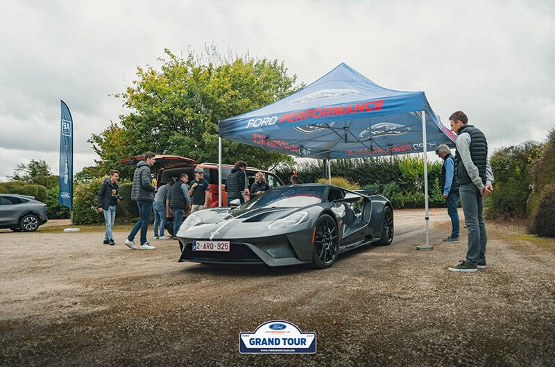 Ford GT driving through tent