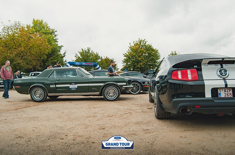 First gen and fourth gen mustangs at show