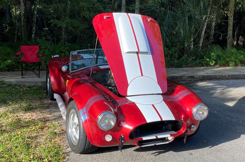 Red Cobra clone with white stripes