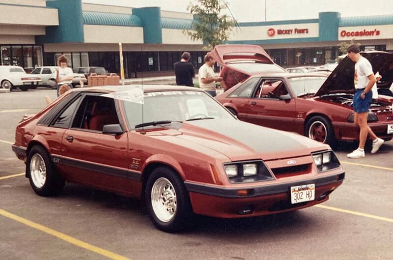 Dark Red foxbody mustang with drag wheel setup