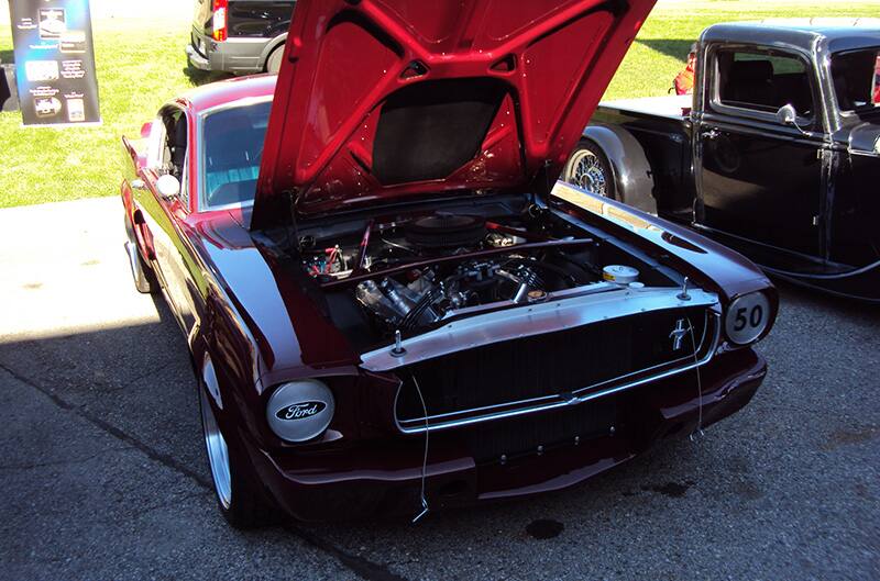 first gen ford mustang with hood open