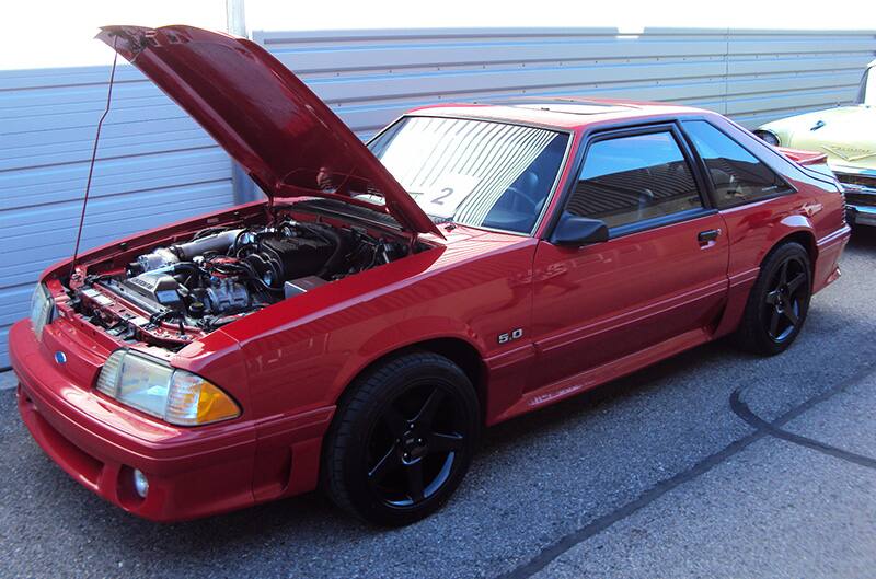 Red Foxbody Mustang with hood open