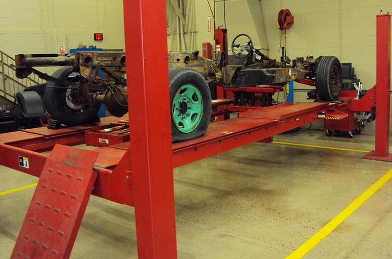 Vehicle chassis on four post lift
