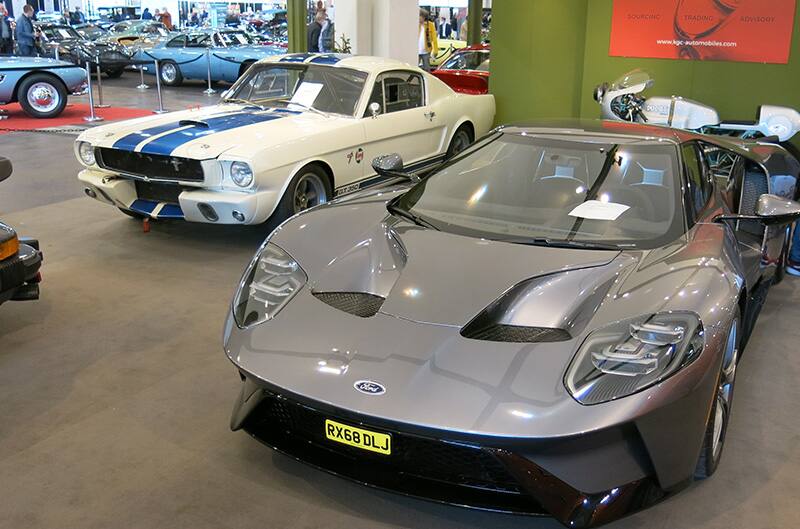 Gen 2 Ford GT with first gen shelby mustang in background