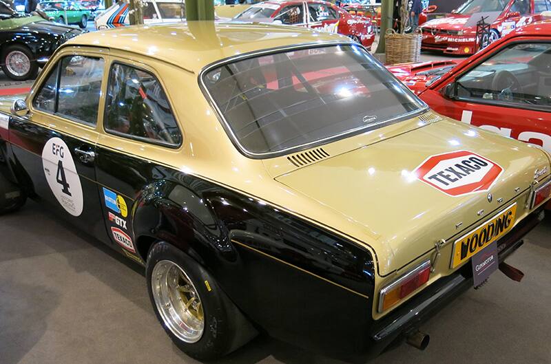 Black and tan ford capri with decals on trunk and side