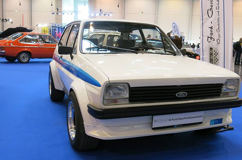 Blue and white Ford Escort