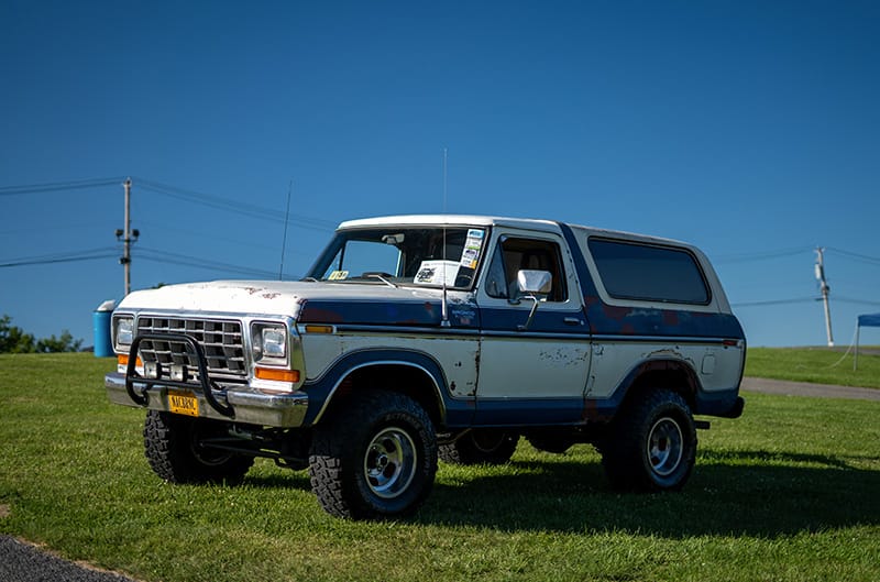 70's ford bronco in blue and white