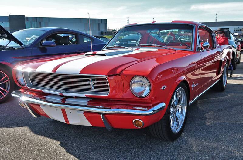 Red and white first generation Ford Mustang