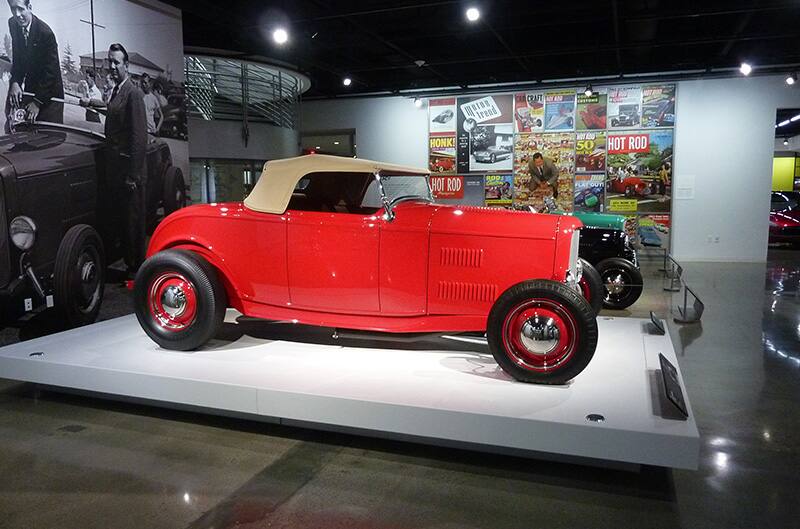 Red 1930s ford on platform