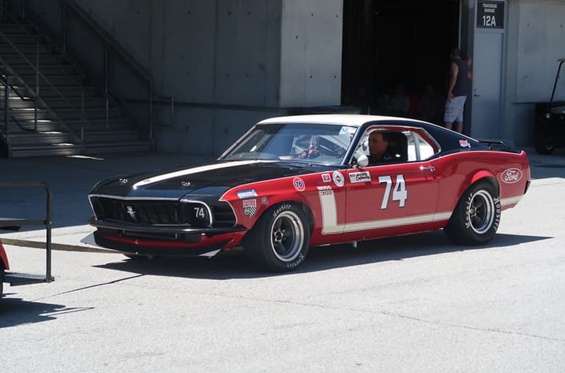 Red and black vintage mustang race car