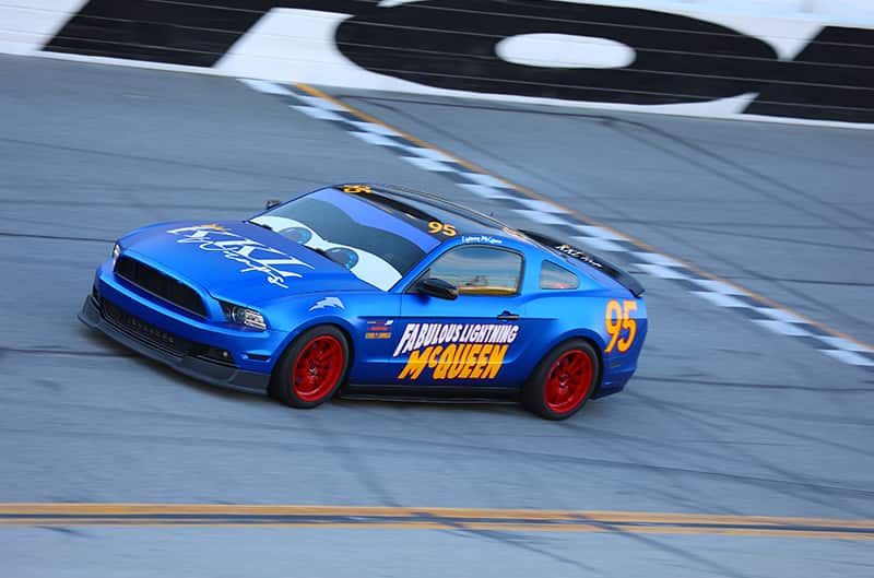 Blue S197 Mustang on track