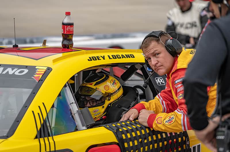 Joey Logano in car with crew chief