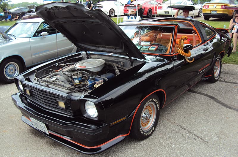 Black and orange Mustang II T top